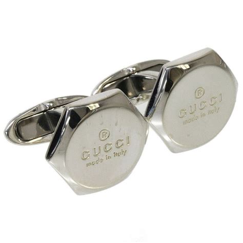 Boutons de manchette noir GUCCI pour Homme .